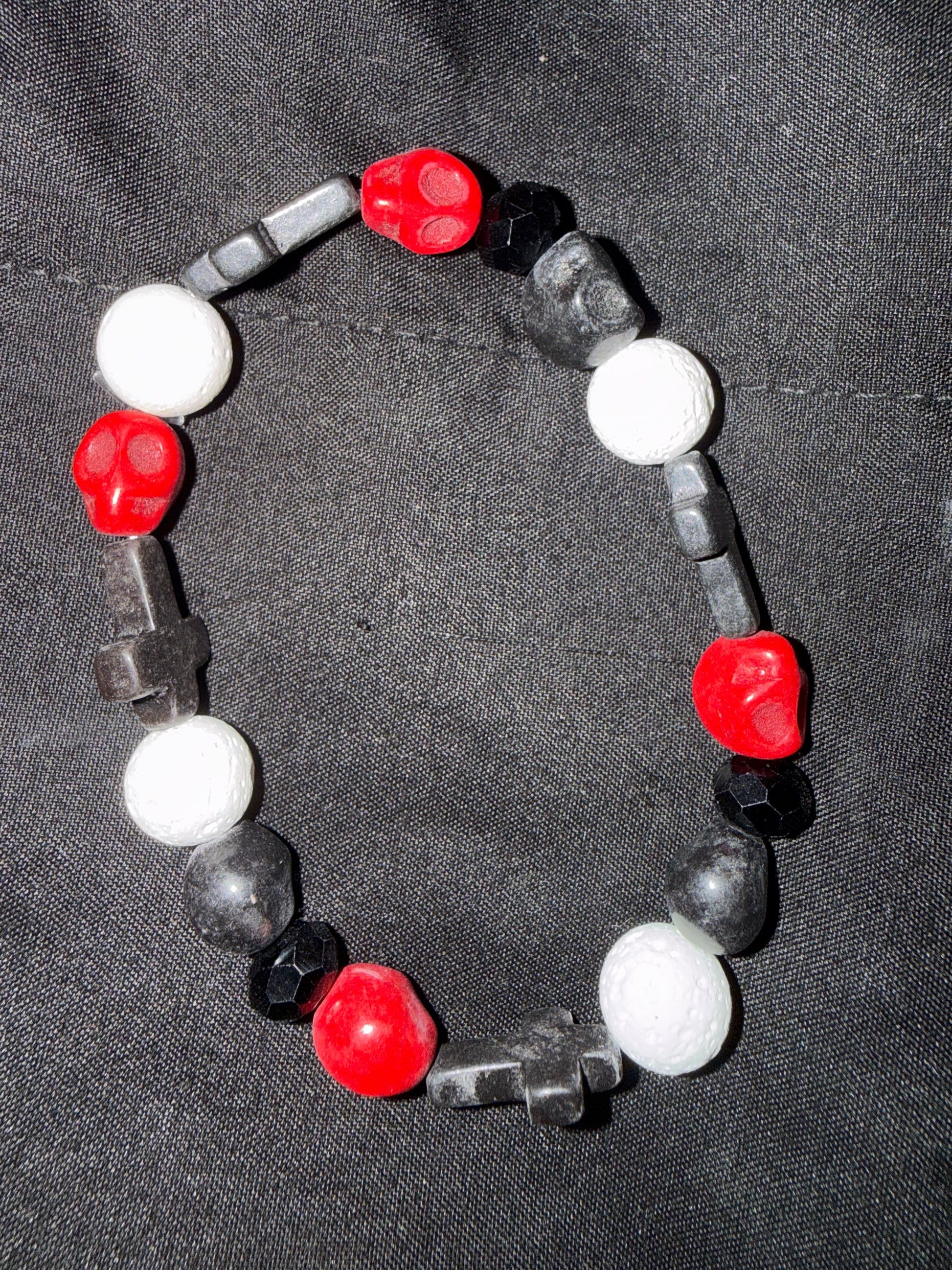 Bracelet W/skulls and crosses