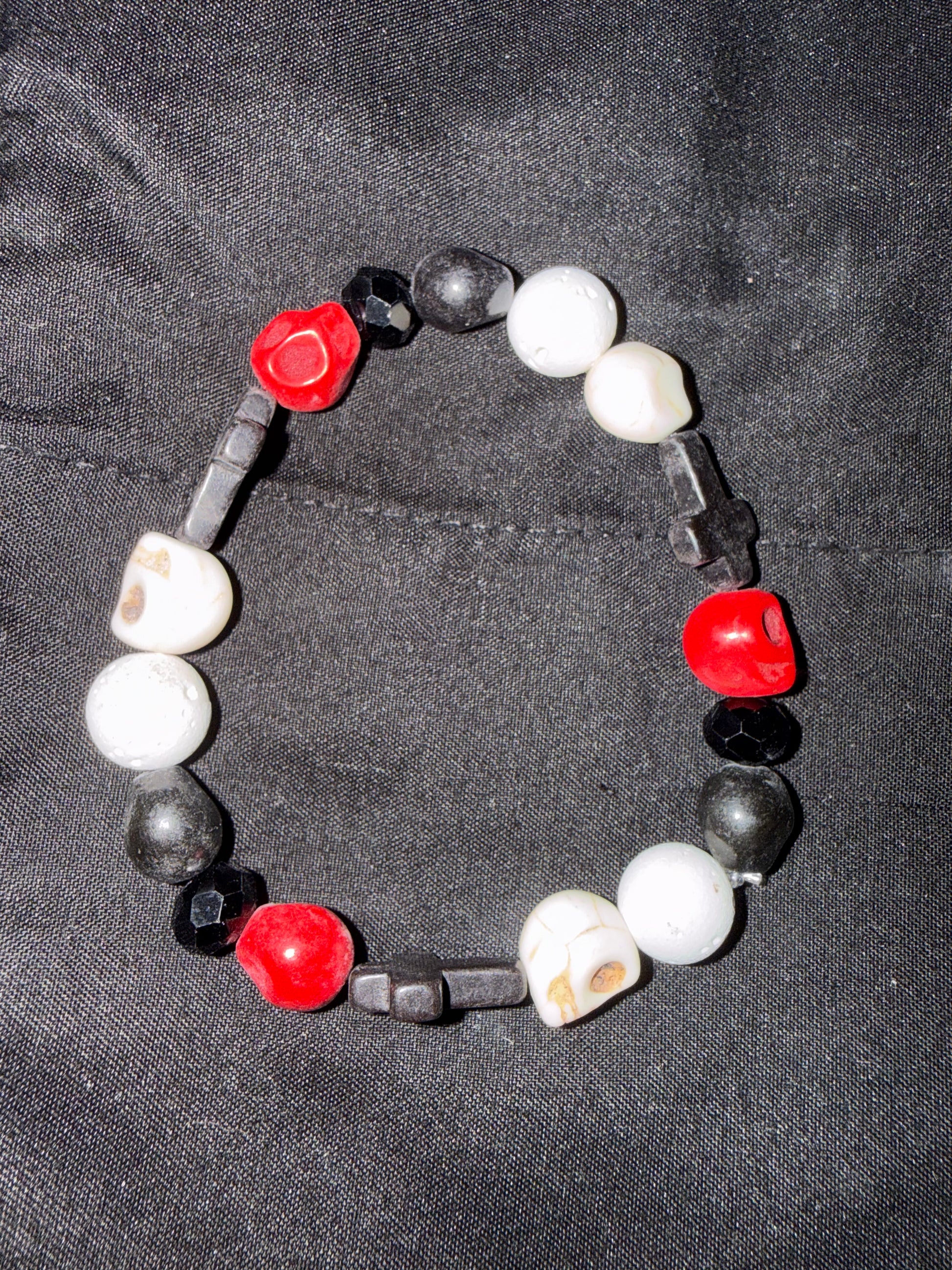 Bracelet W/ skulls, crosses & gems
