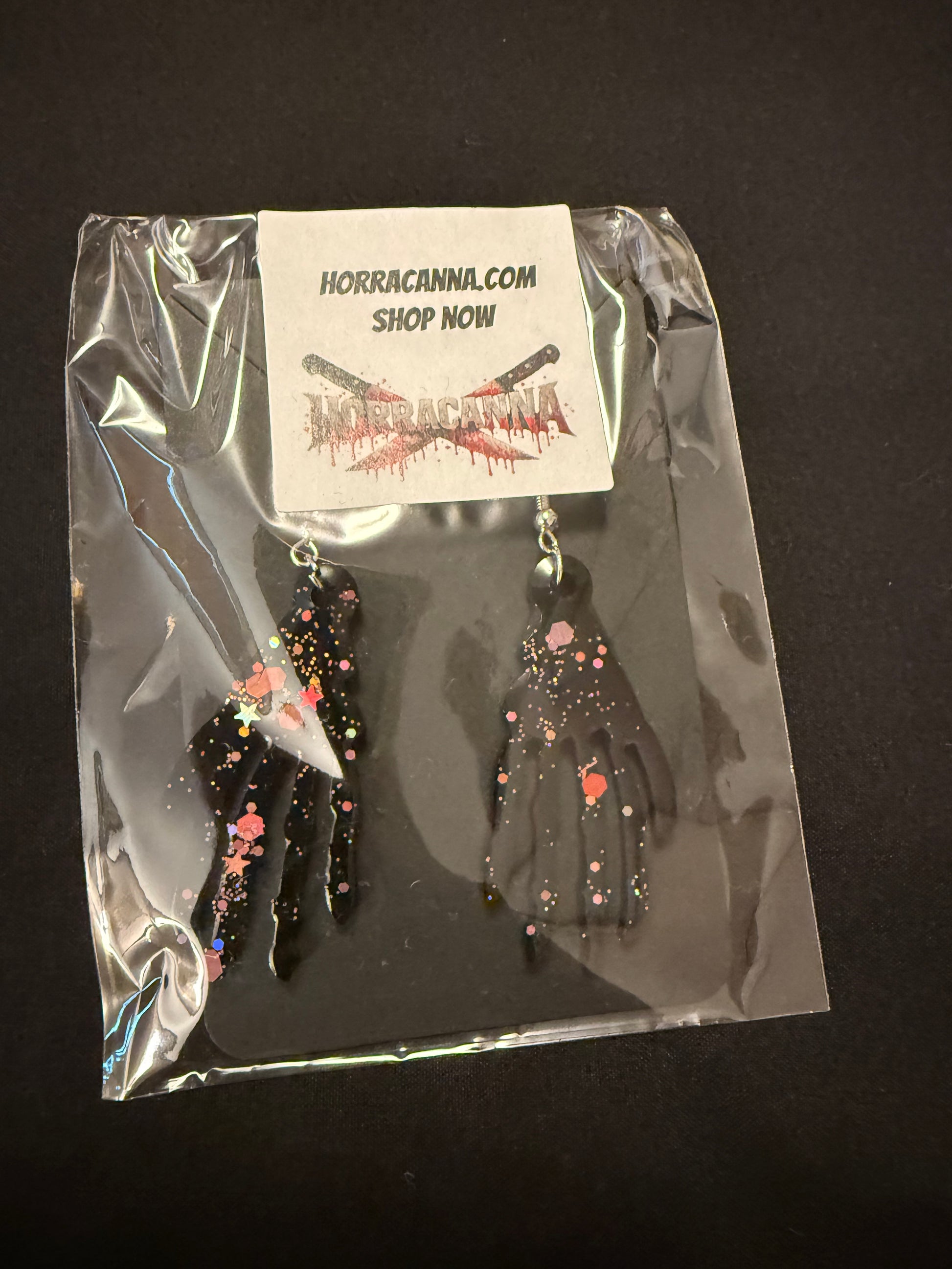 Black skeleton hand earrings W/glitter